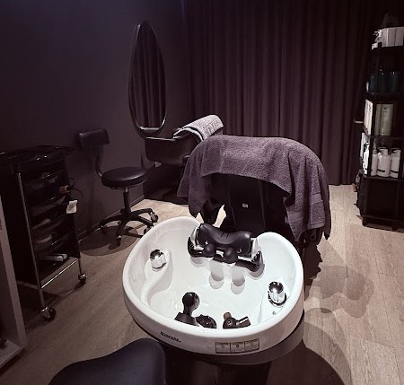 Japanese head spa private treatment room with warm ambient lighting